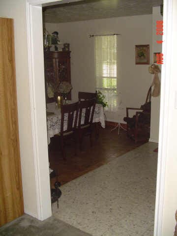 dining space with hardwood / wood-style flooring