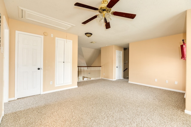 carpeted empty room with ceiling fan