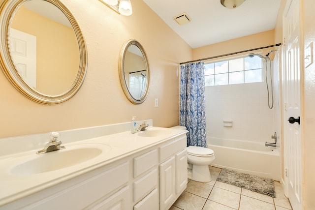 full bathroom featuring tile patterned flooring, shower / bathtub combination with curtain, toilet, and vanity