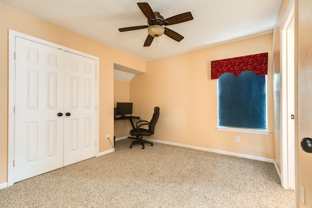 unfurnished office with carpet and ceiling fan