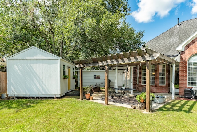 view of yard with a pergola, a storage unit, and a patio area