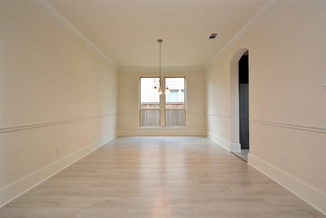 unfurnished dining area with light wood-type flooring and crown molding