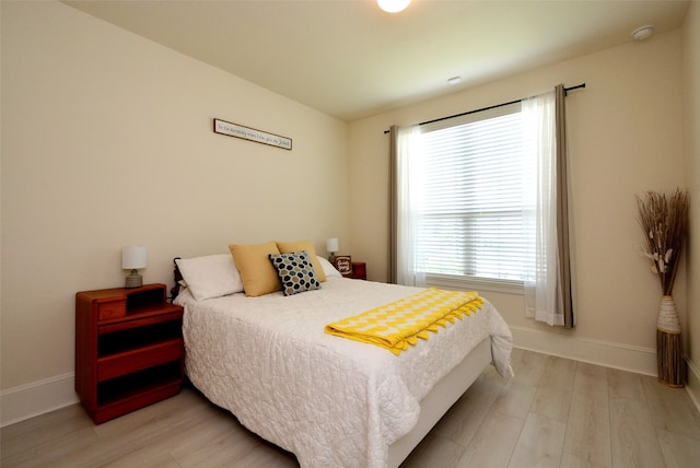 bedroom featuring light hardwood / wood-style flooring