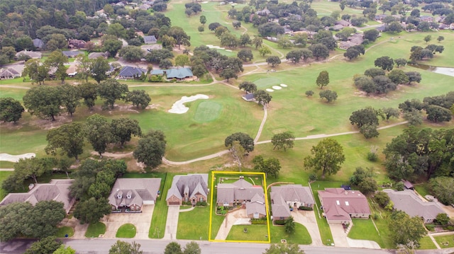 birds eye view of property featuring golf course view and a residential view