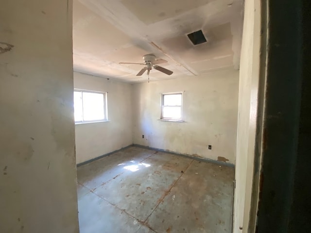 spare room with ceiling fan