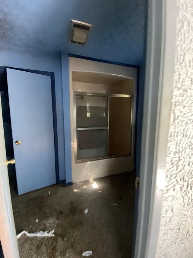 property entrance featuring visible vents