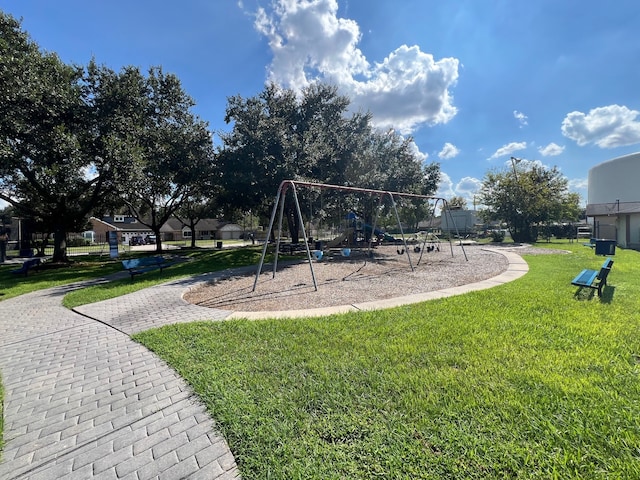 view of play area featuring a lawn