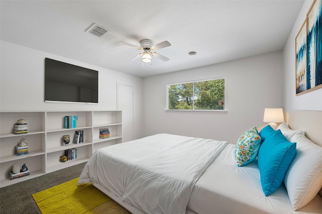 carpeted bedroom with ceiling fan