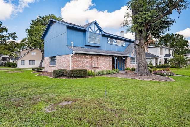 view of front of home with a front yard