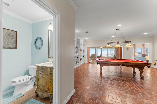 recreation room featuring ornamental molding and billiards