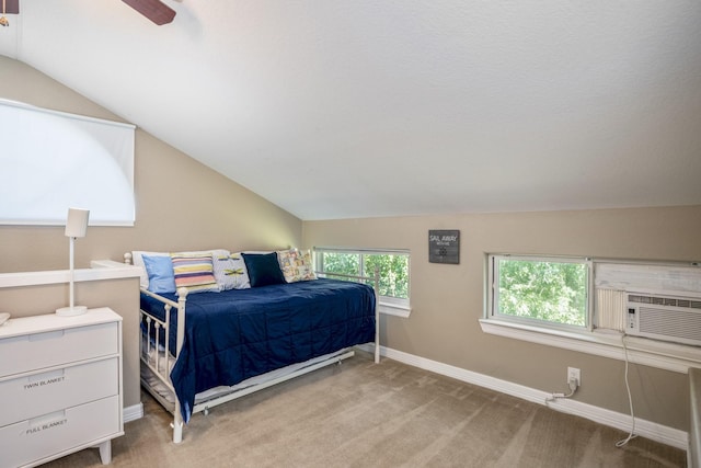 bedroom featuring cooling unit, light colored carpet, ceiling fan, and lofted ceiling