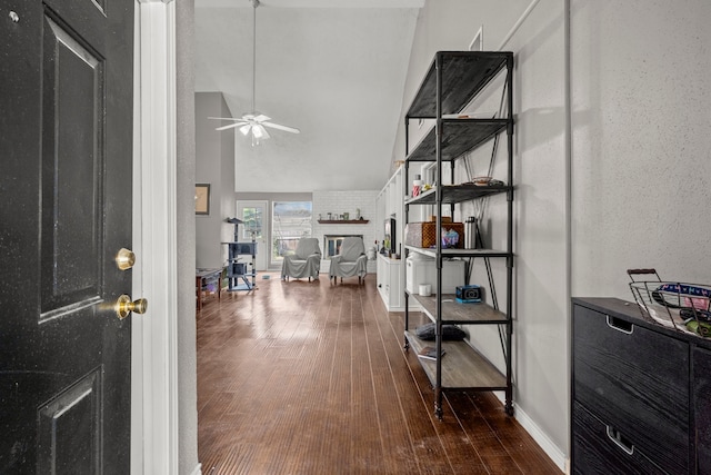 interior space featuring dark hardwood / wood-style floors and vaulted ceiling