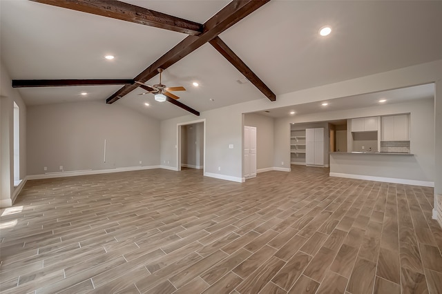 unfurnished living room with ceiling fan, light hardwood / wood-style flooring, and lofted ceiling with beams