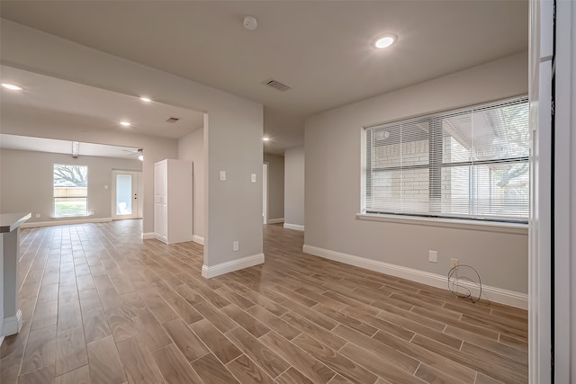 unfurnished room featuring hardwood / wood-style floors