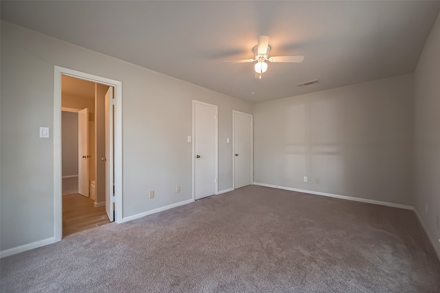 unfurnished bedroom with carpet flooring and ceiling fan