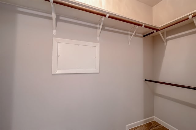 spacious closet with electric panel