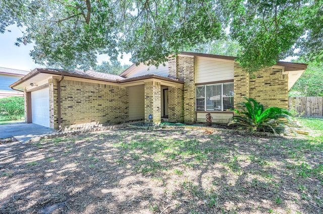 view of front of property featuring a garage