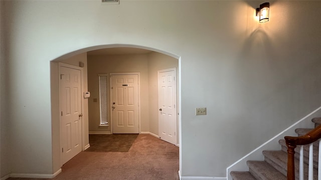 hallway with carpet