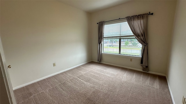 view of carpeted spare room