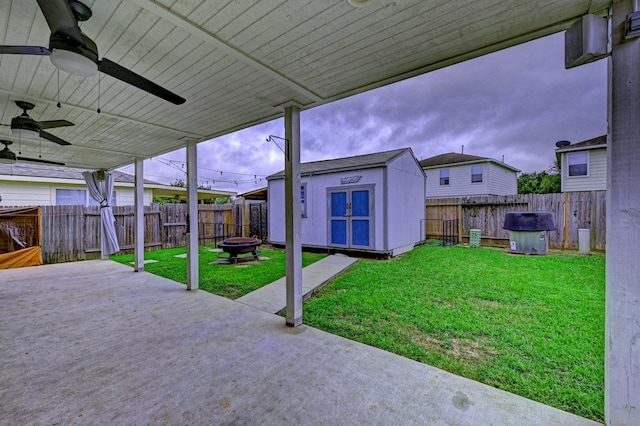 view of patio / terrace featuring a storage unit and ceiling fan