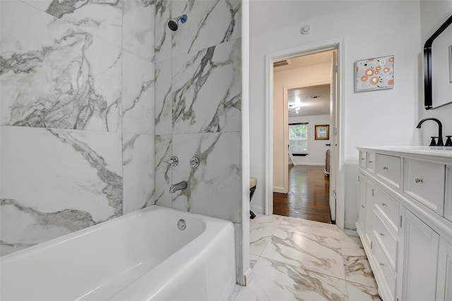706 Beaumont St, Anahuac, TX 77514 - bathroom with vanity and marble finish flooring