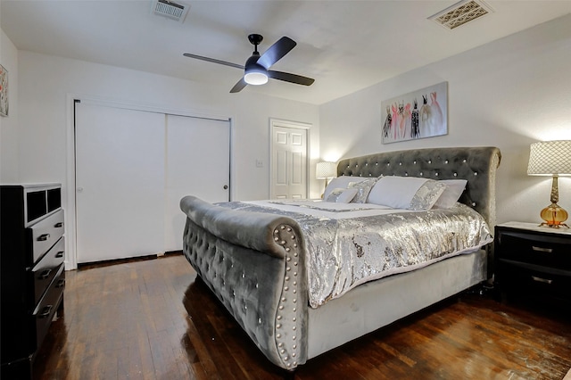 706 Beaumont St, Anahuac, TX 77514 - bedroom featuring hardwood / wood-style floors, a closet, and a ceiling fan