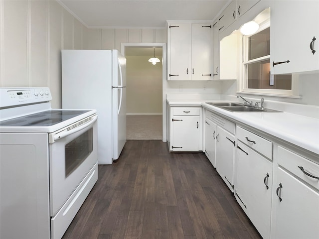 kitchen featuring white cabinets, white appliances, crown molding, dark hardwood / wood-style floors, and sink