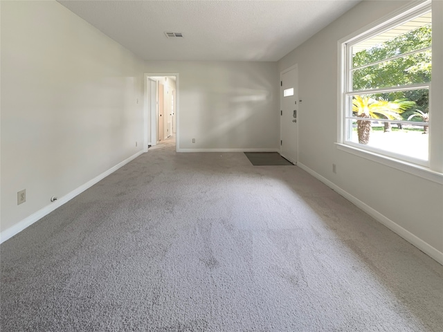 empty room with carpet floors