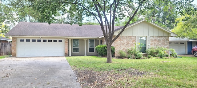 ranch-style house with a front lawn and a garage