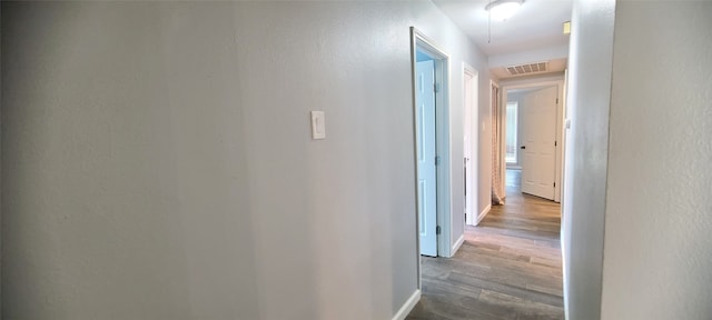 hall featuring hardwood / wood-style floors