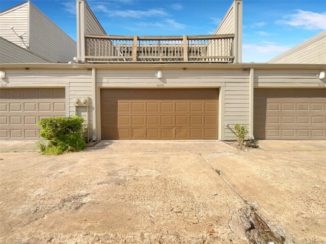 view of property exterior with a garage