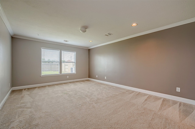 carpeted empty room with ornamental molding