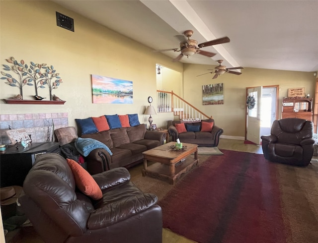 living room with vaulted ceiling, ceiling fan, a fireplace, and carpet flooring