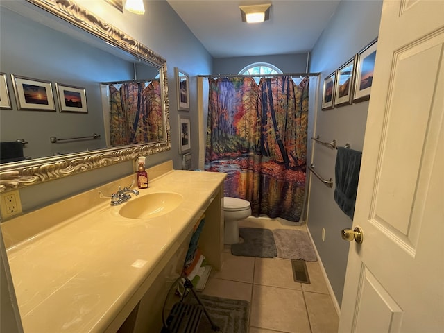 bathroom featuring tile patterned flooring, vanity, toilet, and a shower with shower curtain