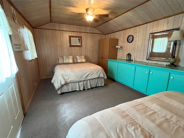 carpeted bedroom with wood ceiling, vaulted ceiling, ceiling fan, and wood walls