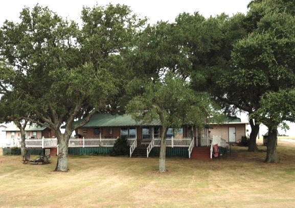 view of yard with covered porch