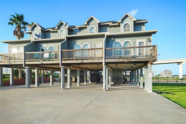 back of property featuring a carport