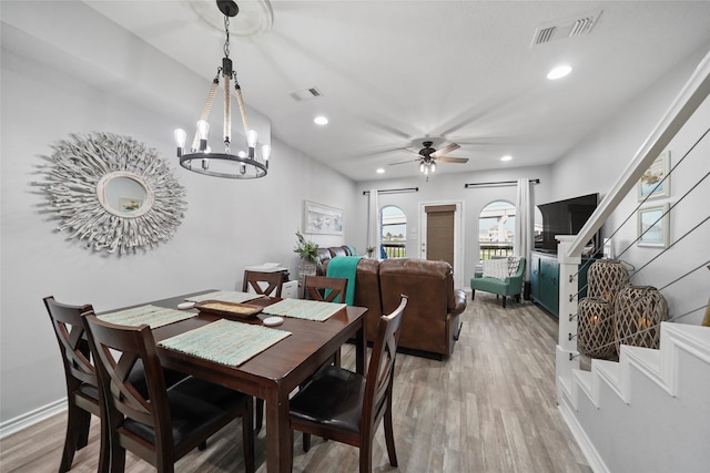 dining space featuring ceiling fan and light hardwood / wood-style flooring