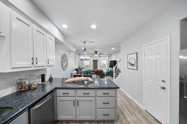 kitchen featuring kitchen peninsula, pendant lighting, ceiling fan, light hardwood / wood-style flooring, and stainless steel dishwasher