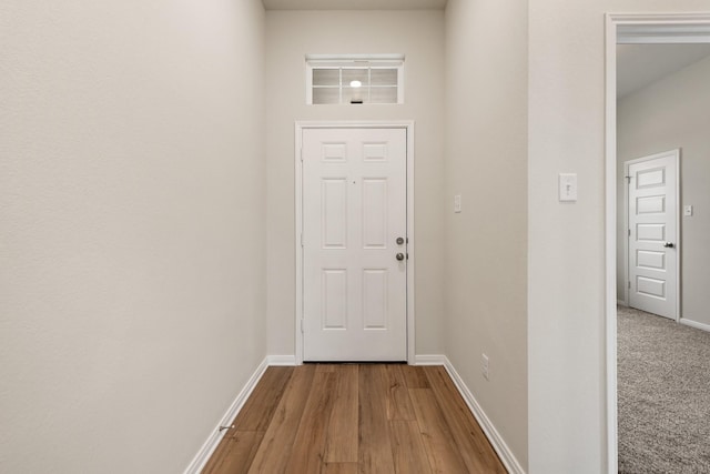 doorway with light hardwood / wood-style floors