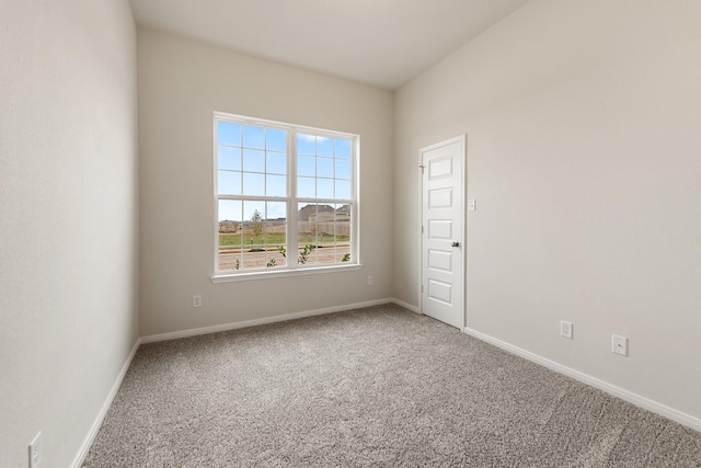 spare room with carpet flooring