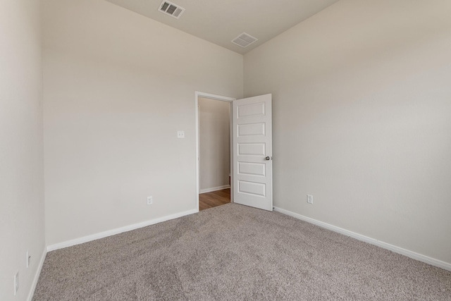 spare room with carpet floors