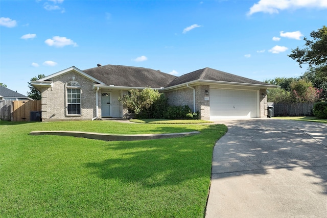 single story home featuring a front lawn, central AC unit, and a garage