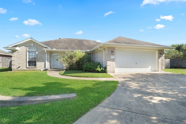 ranch-style home featuring a front lawn and a garage