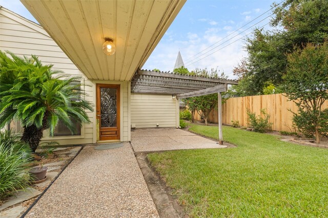 exterior space with a pergola, a patio area, and a yard