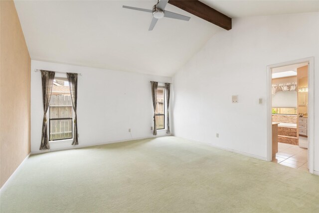 interior space with high vaulted ceiling, ceiling fan, and beamed ceiling