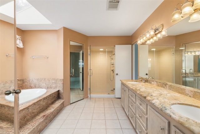 bathroom with vanity, separate shower and tub, and tile patterned floors