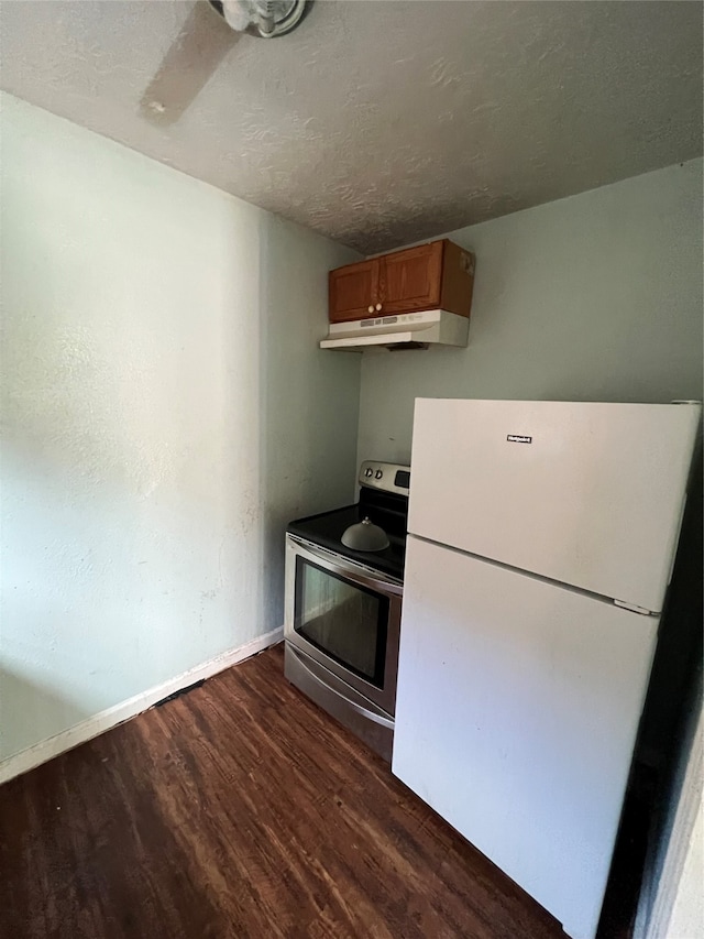 kitchen featuring a textured ceiling, dark hardwood / wood-style floors, stainless steel electric range oven, and white fridge