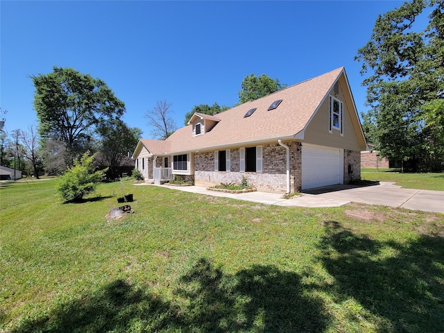 cape cod-style house featuring brick siding, a shingled roof, a front yard, a garage, and driveway