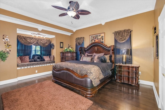 bedroom with crown molding, dark hardwood / wood-style floors, and ceiling fan